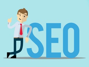 Man standing next to SEO sign with thumb up 