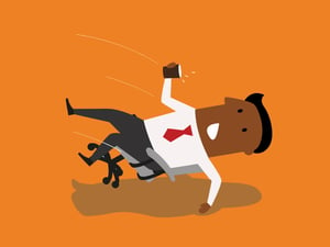 Business man falling off a chair with a cup in his hand
