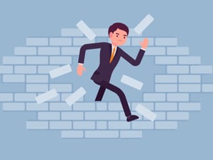 Recruiter breaking through brick wall 