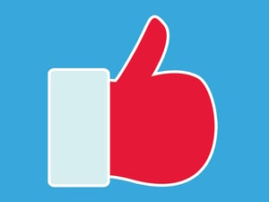 A Facebook 'like' symbol wearing Santa's glove